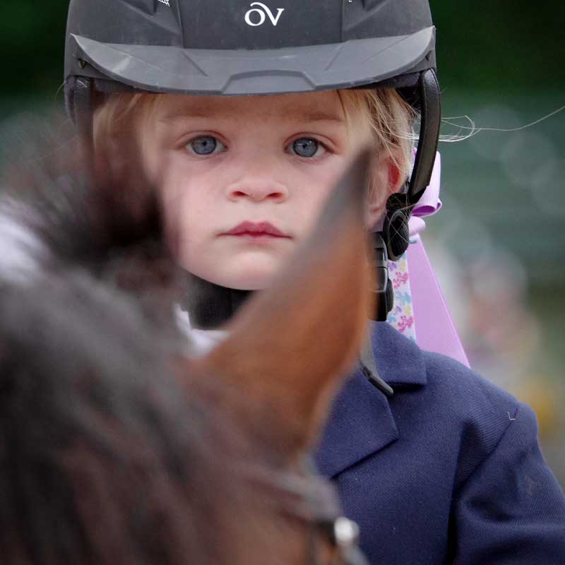 child on  horse