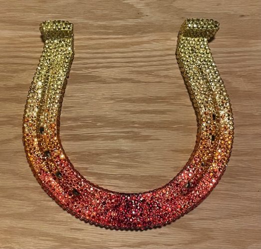Giant Draft Horse Pulling Shoe 8.25” x 8.5” custom made, bedazzled in gold, amber and garnet by GCHS member Laura Lawson